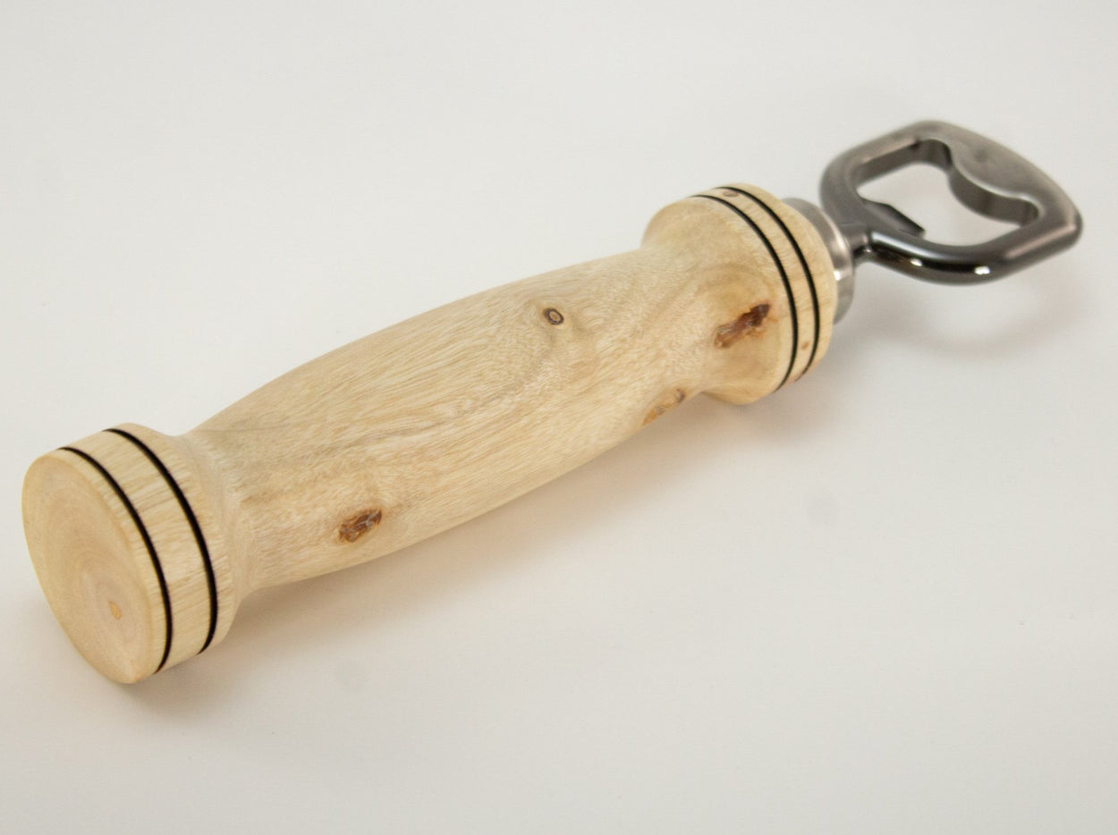 This handmade wooden bottle opener is made from (Campher). This wood came from Phoesbes Forest in California. The hardware is (Stainless Steel, pewter in color) This custom one-of-a-kind wooden bottle opener will definitely impress your friends.
