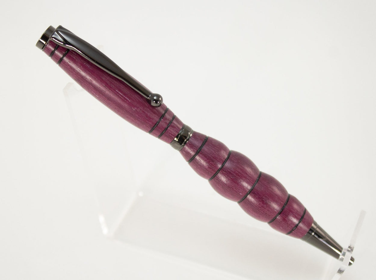This handcrafted pen is made from Purple Heartwood, providing a firm and comfortable grip. The clip and rings on the cap, barrel, and tip enhance the pen’s beauty. This classic twist pen, the Slimline is an all-time favorite. Quality components like the Swiss-made carbide writing tip make the Slimline pen a fantastic writing choice.