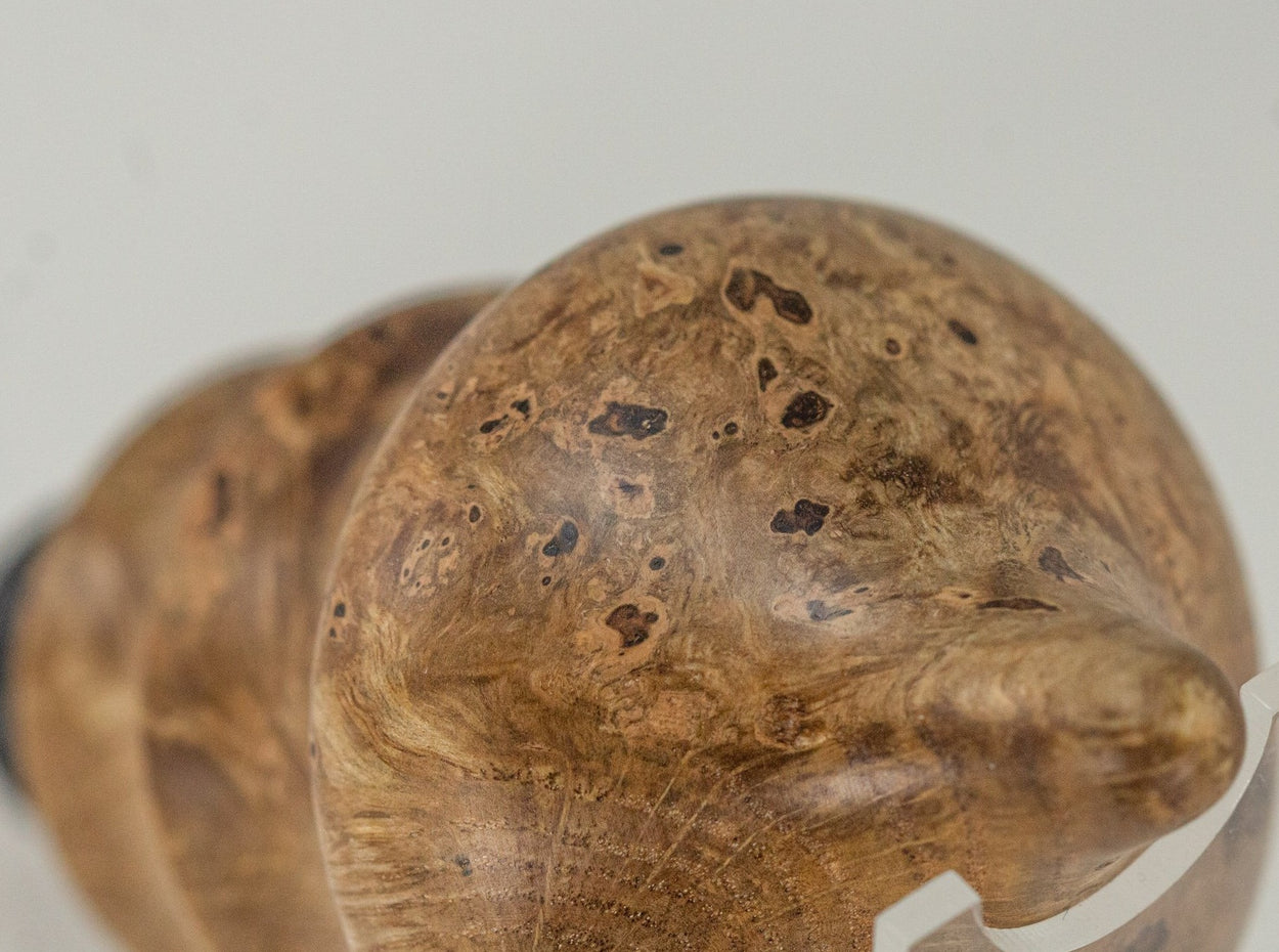 This handmade wooden stopper is made from Black Cherry Burl. This custom one-of-a-kind wooden wine stopper was turned from a burl that was harvested next to the Kennebec River in Maine.