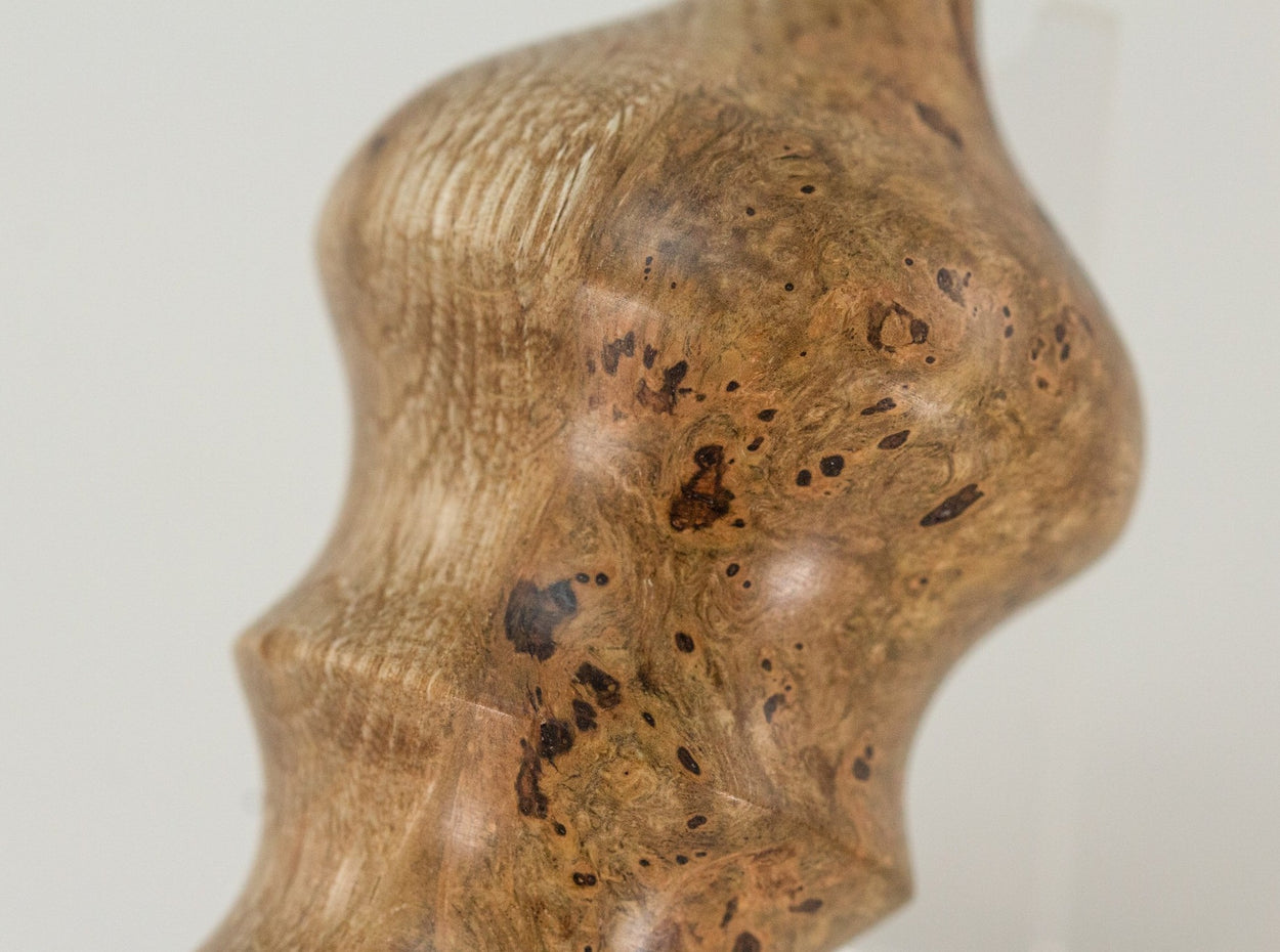 This handmade wooden stopper is made from Black Cherry Burl. This custom one-of-a-kind wooden wine stopper was turned from a burl that was harvested next to the Kennebec River in Maine.