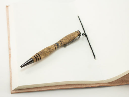 This handcrafted pen is made from hardwood, providing a firm and comfortable grip. The clip and rings on the cap, barrel, and tip enhance the pen’s beauty. This classic twist pen, the Slimline is an all-time favorite. Quality components like the Swiss-made carbide writing tip make the Slimline pen a fantastic writing choice.